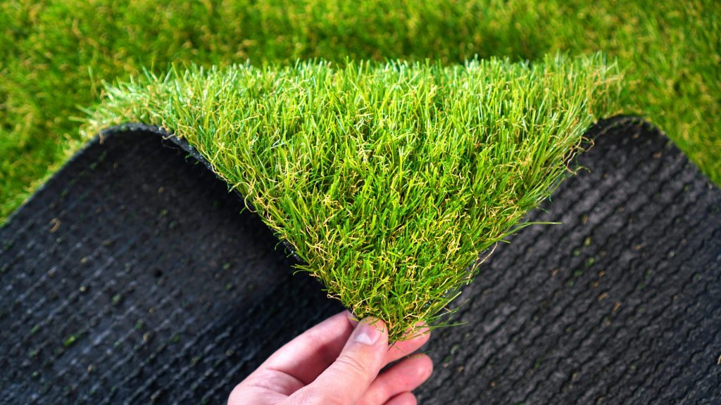 The backing of artificial or synthetic grass